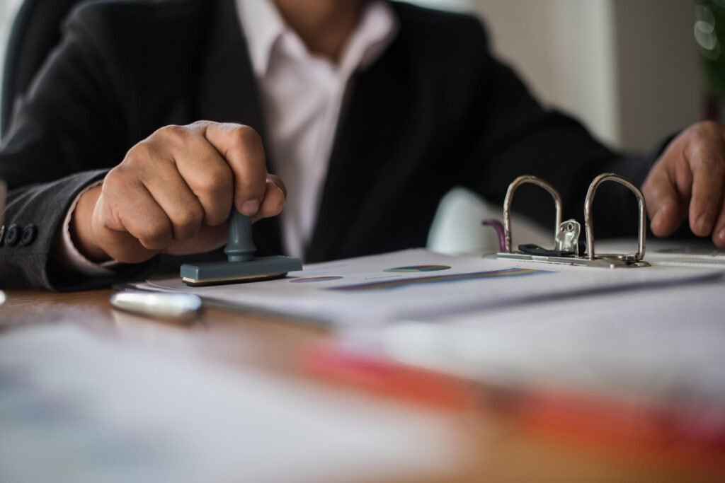 businessman hand pressing rubber stamp approved on 2025 01 16 15 11 12 utc.jpg